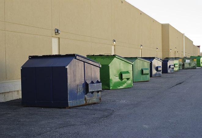 a stack of yellow construction dumpsters on a job site in Granger, IN